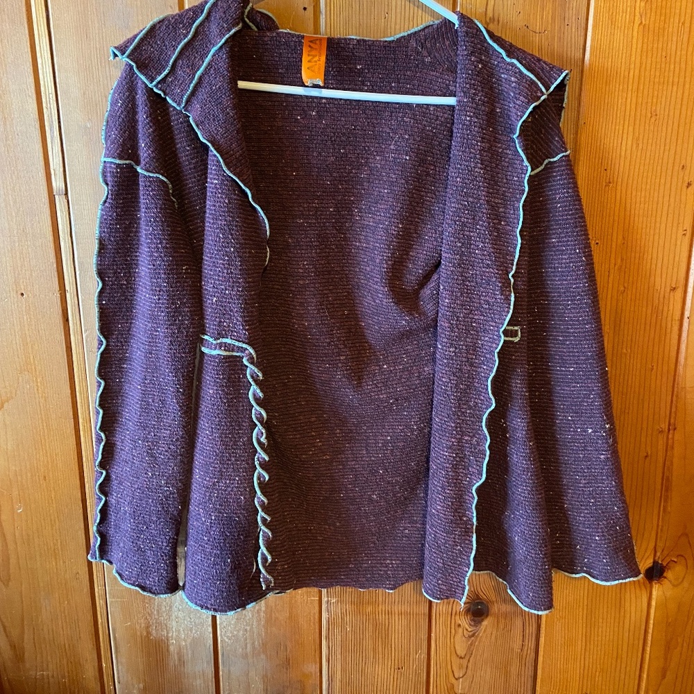 Funky purple and teal sweater.